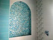 Облицовка стен мозаикой декоративным камнем,  кафелем